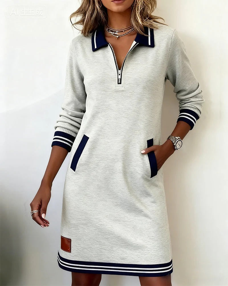 Delia | L'abito con zip frontale e revers
