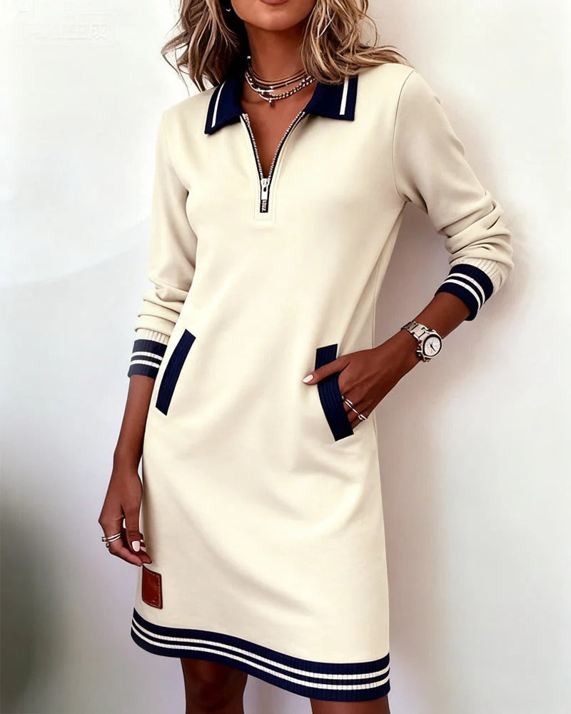 Delia | L'abito con zip frontale e revers