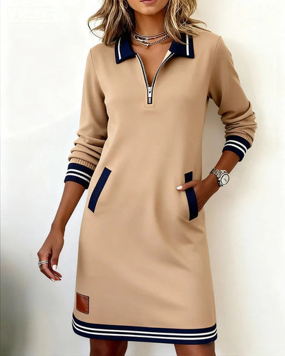 Delia | L'abito con zip frontale e revers