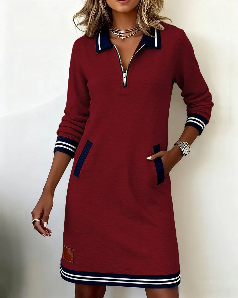 Delia | L'abito con zip frontale e revers