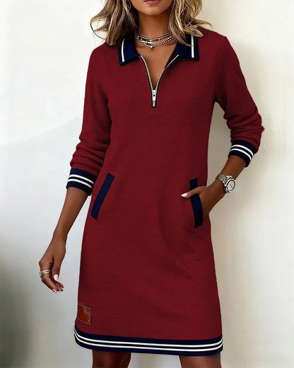 Delia | L'abito con zip frontale e revers